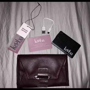 Kooba leather wallet with portable charger